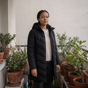 Women's Hooded Winter Coat - Black - balcony with plants