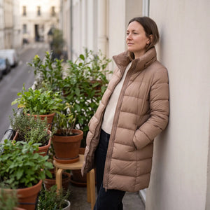 Women's Premium Down Coat - Nougat - balcony with plants
